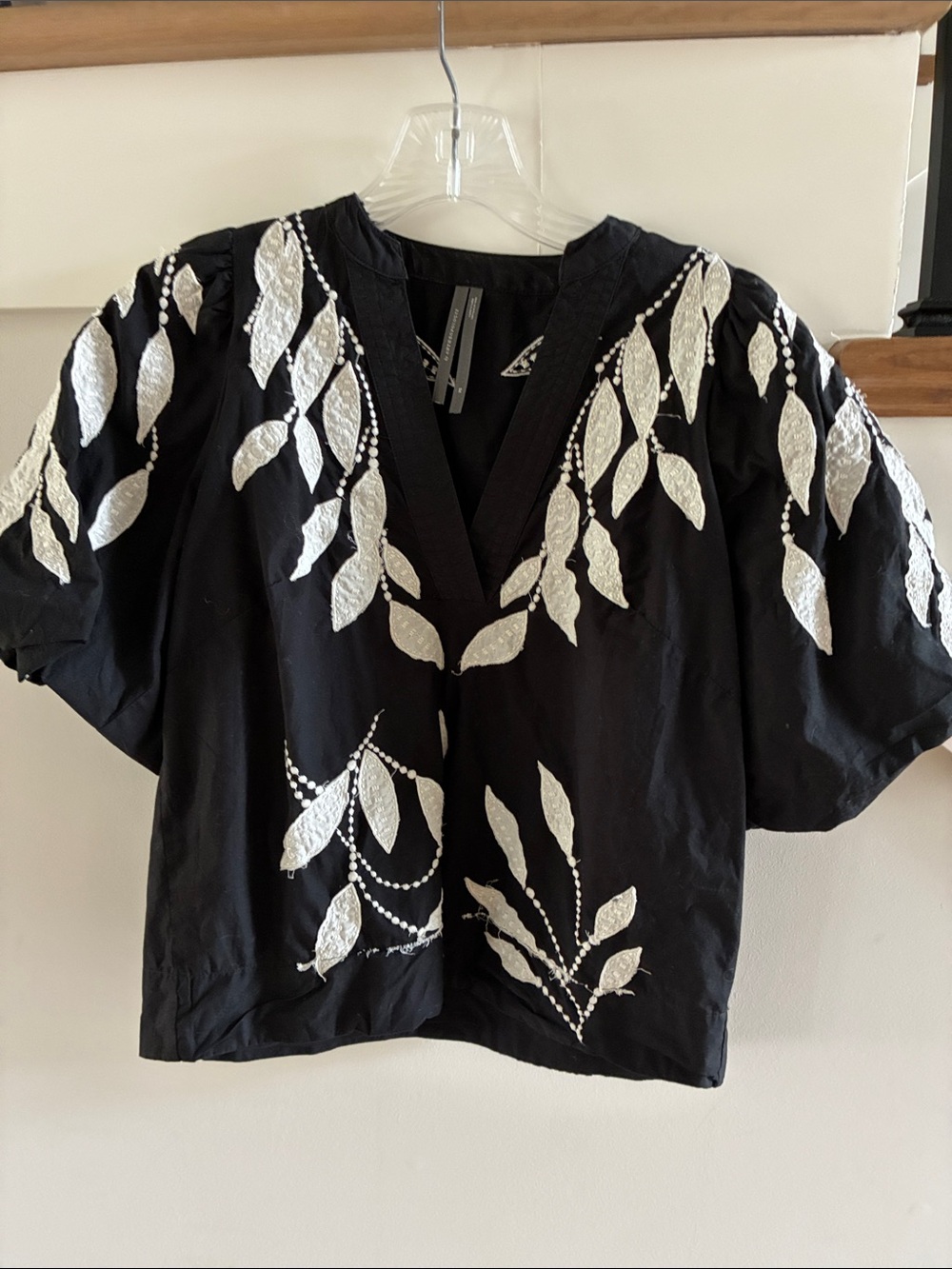 By Anthropologie Black V-Neck Blouse with White Leaf Motif